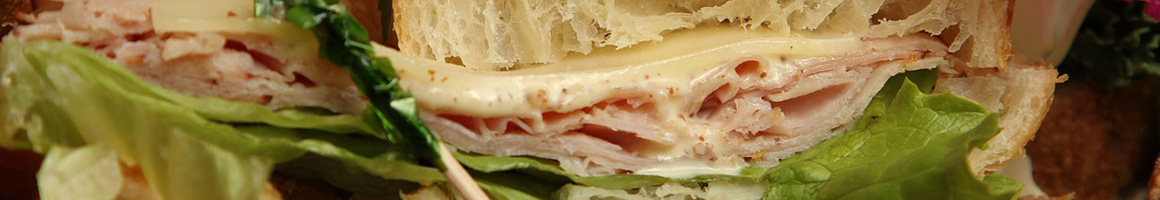 Eating Sandwich Bakery at Cuba Bakery & Deli restaurant in Cuba, MO.